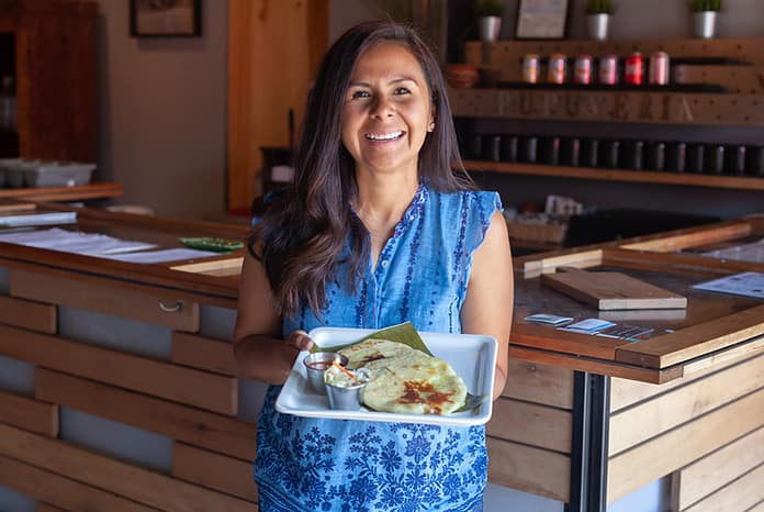 Monse, owner of Monse's Taste of El Salvador